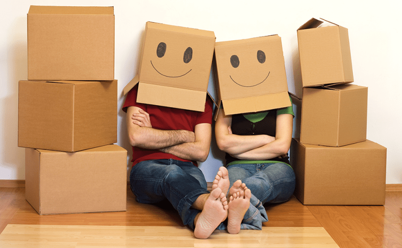 couple with moving boxes